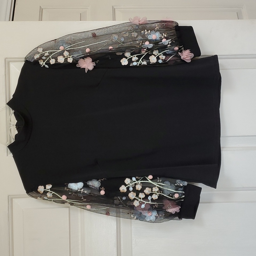Size large mock neck blouse.